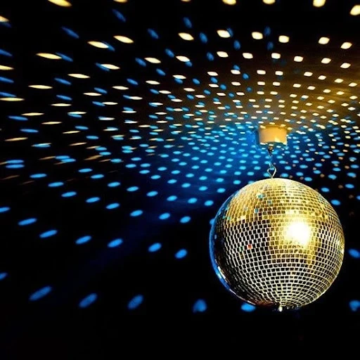 An image of a disco ball hung from the ceiling.
